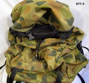 Camouflaged back pack and Milbank filter