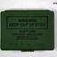 Green tin containing 3 x camouflage skin colours