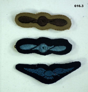 Three styles of RAAF uniform Rank insignia