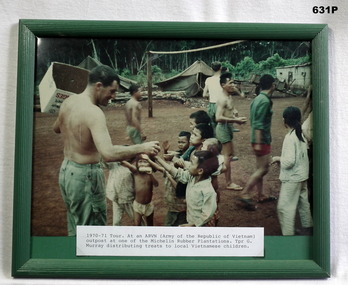 Photograph showing Vietnamese receiving rations