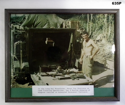 Photo showing a Trooper with weapons Vietnam