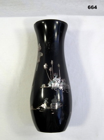 Black embossed vase souvenired from Vietnam
