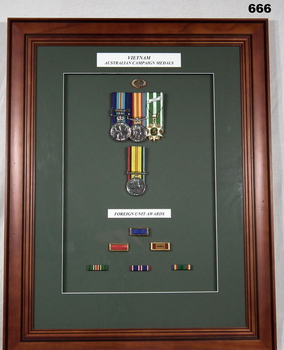 Mounted frame with awards, citations for Australia Vietnam