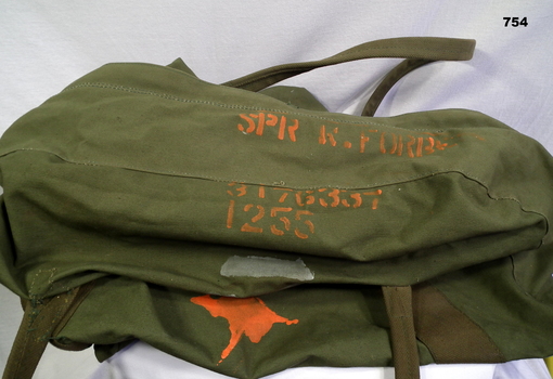 Green canvas bag painted for Vietnam