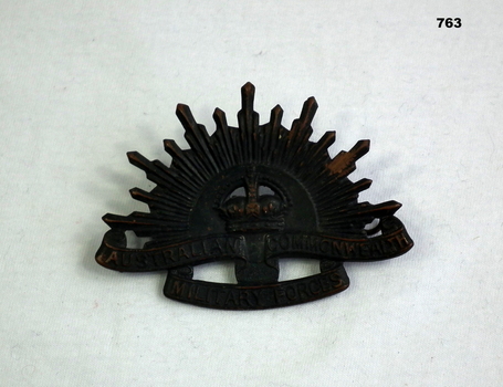 Blackened Rising Sun hat badge.