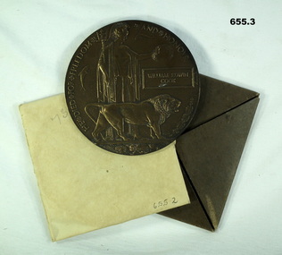 WW1 memorial plaque and container