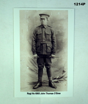 B & photo of a soldier with text under.