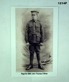 B & photo of a soldier with text under.