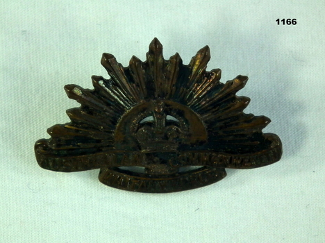 Single uniform lapel rising sun badge