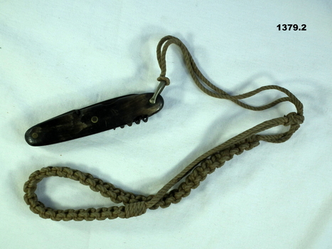 Pen knife with braided cord lanyard