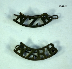 Two differant NZ uniform badges