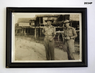Two Australian soldiers in native village WW2