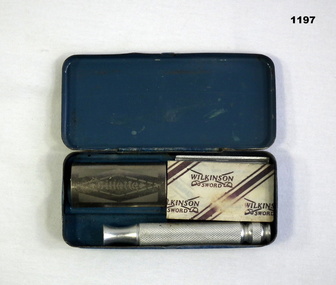 Razor shaving kit in a blue tin