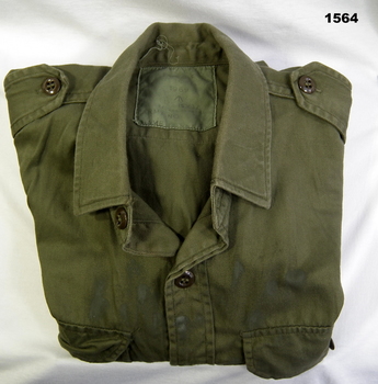 One jungle green Australian Army shirt