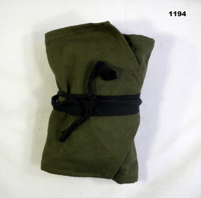 Green folding Army issue sewing kit
