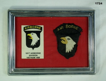 Framed item showing U.S Airborne colour patches