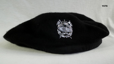 Black beret with cavalry badge 
