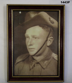 Framed sepia portrait of WW2 soldier