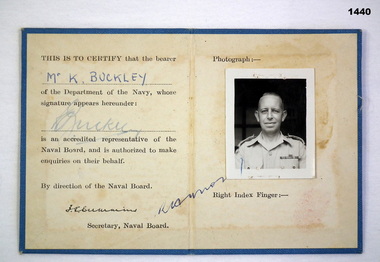 Identification card with photo insert.