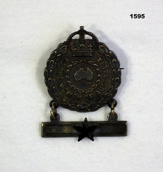 Female relative badge issued to women