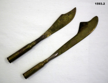 Brass trench art, cheese & butter knives