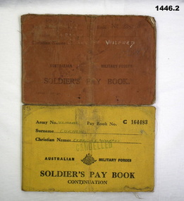 Two pay books relating to a WW2 soldier.