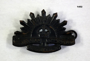 One single lapel collar rising sun badge.