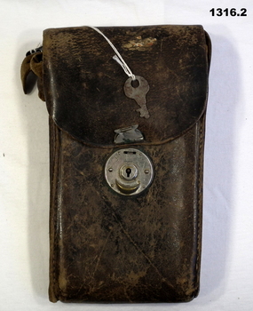 Brown leather camera case with key