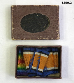 Small box with fragments of WW1 ribbons