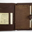 Showing the contents of a leather wallet
