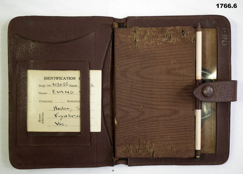Showing the contents of a leather wallet