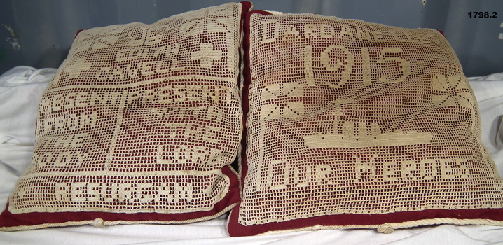 Two cushions one re Edith Cavell, one the Dardanelles.