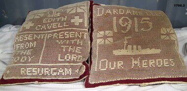 Two cushions one re Edith Cavell, one the Dardanelles.