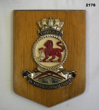 HMAS Hobart plaque mounted on wood base