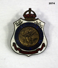 RSL badge with two central figures.