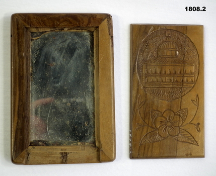 Inside of carved wood mirror case Jerusalem 