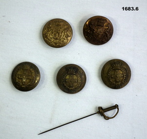 Series of 5 uniform buttons and sword pin.