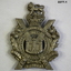 Three British badges part of a wider collection