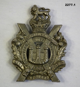 Three British badges part of a wider collection