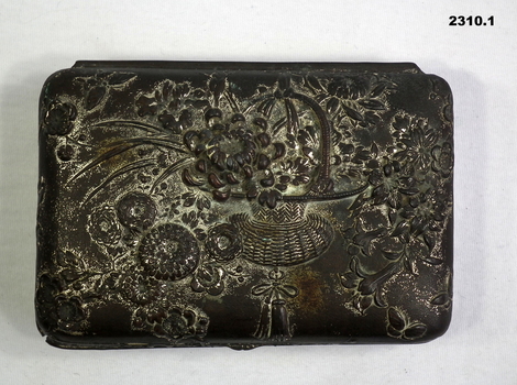 Ornate hinged tin with assorted wartime photos