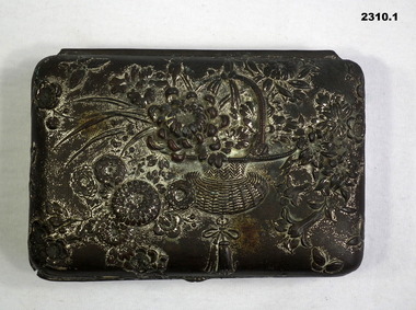 Ornate hinged tin with assorted wartime photos