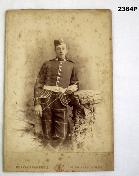 Photograph of a soldier in uniform c. 1888.