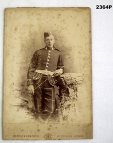 Photograph of a soldier in uniform c. 1888.