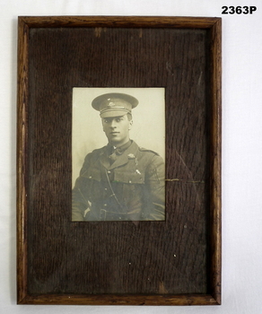Sepia tone framed photograph WW1 soldier.