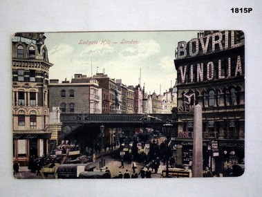 Coloured postcard scene of city in England.