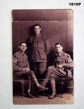 Sepia tone photo showing 3 WW1 soldiers