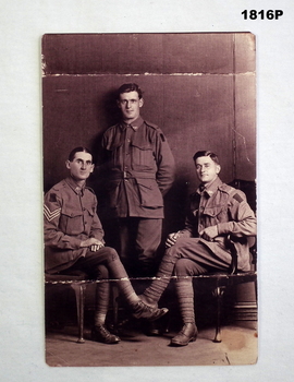 Sepia tone photo showing 3 WW1 soldiers