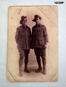 Sepia tone photo of two WW1 soldiers