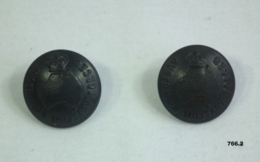 Blackened WW2 Army uniform buttons