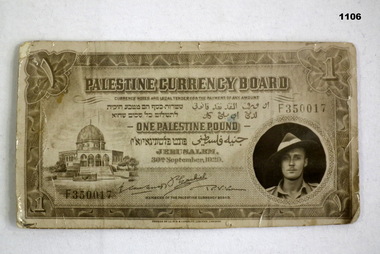 Palestine currency note with photo inset